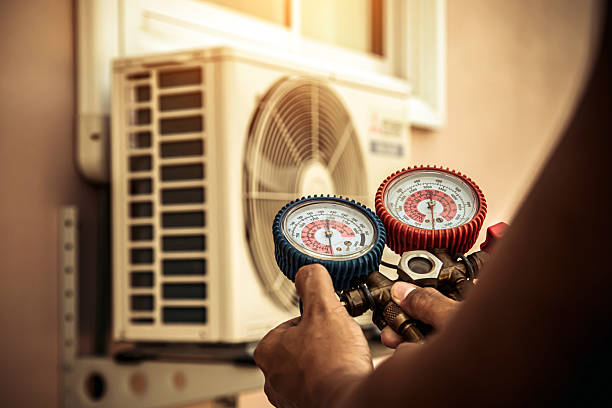 Professional Air Conditioning Service technician working in Chestnut Ridge, PA